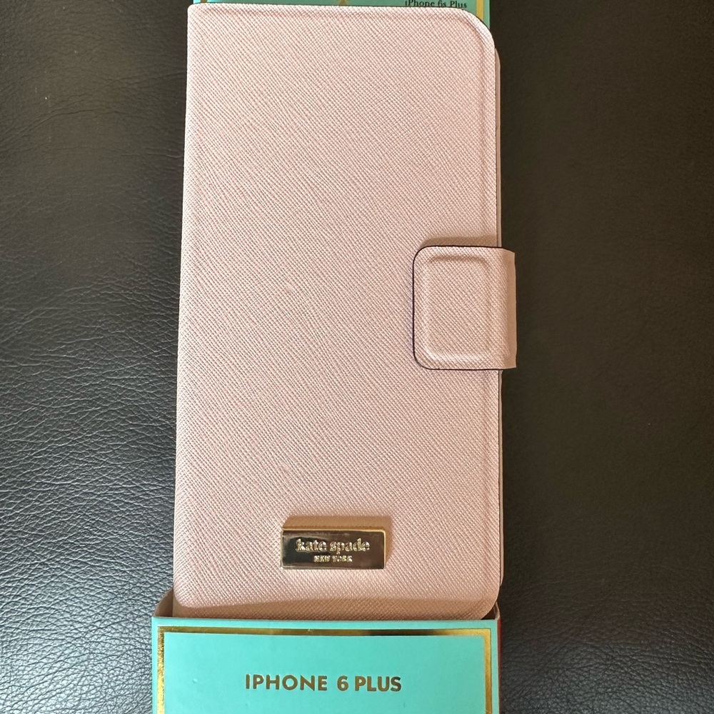 Kate Spade iPhone 6 Plus excellent used condition phone case with card slots.